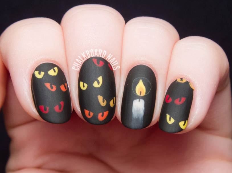 spooky-eyes-candle-nail-art-3